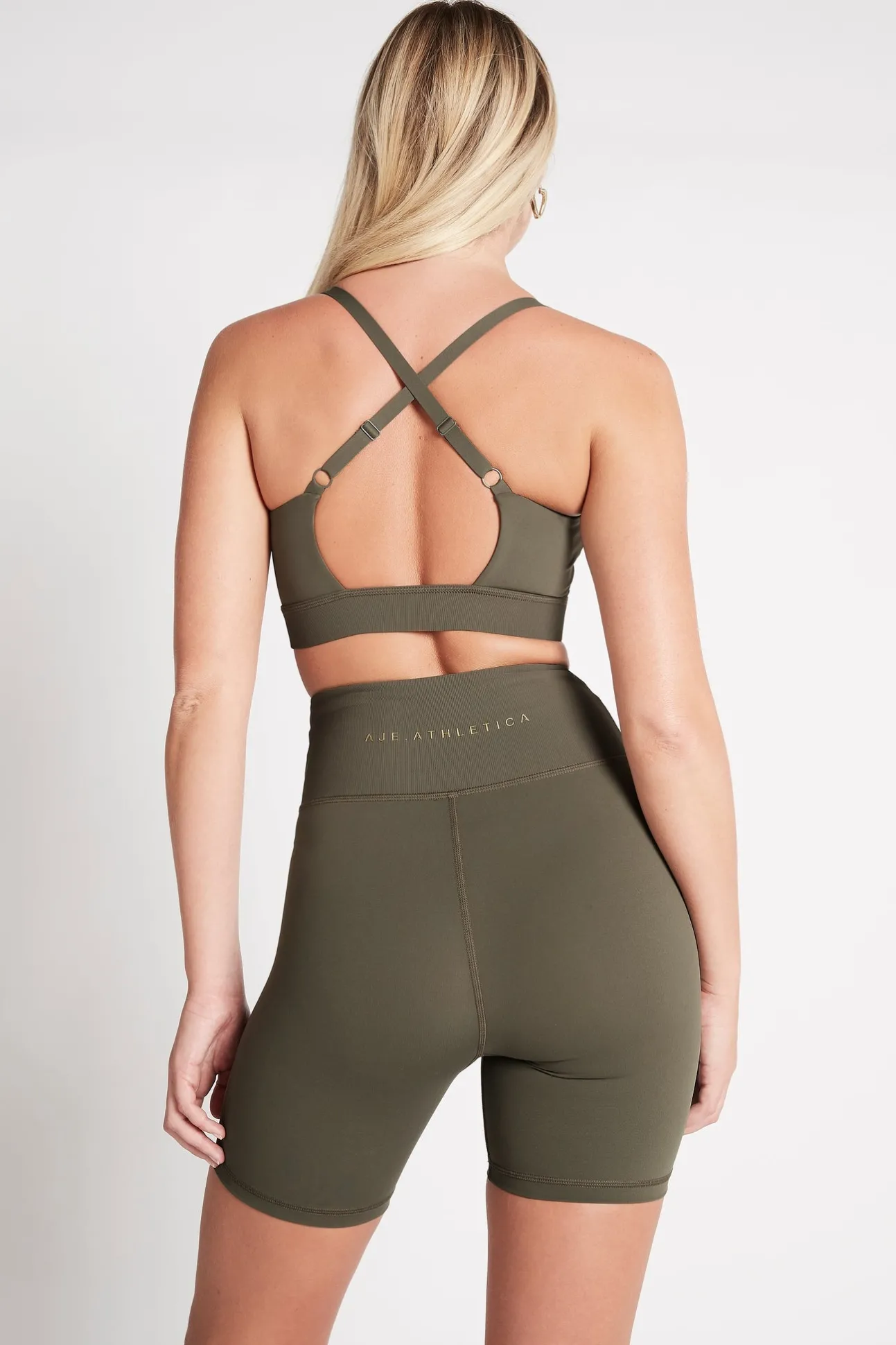 adjustable_strap_ribbed_c_4.webp Adjustable Strap Ribbed Cross Back Sports Bra 322