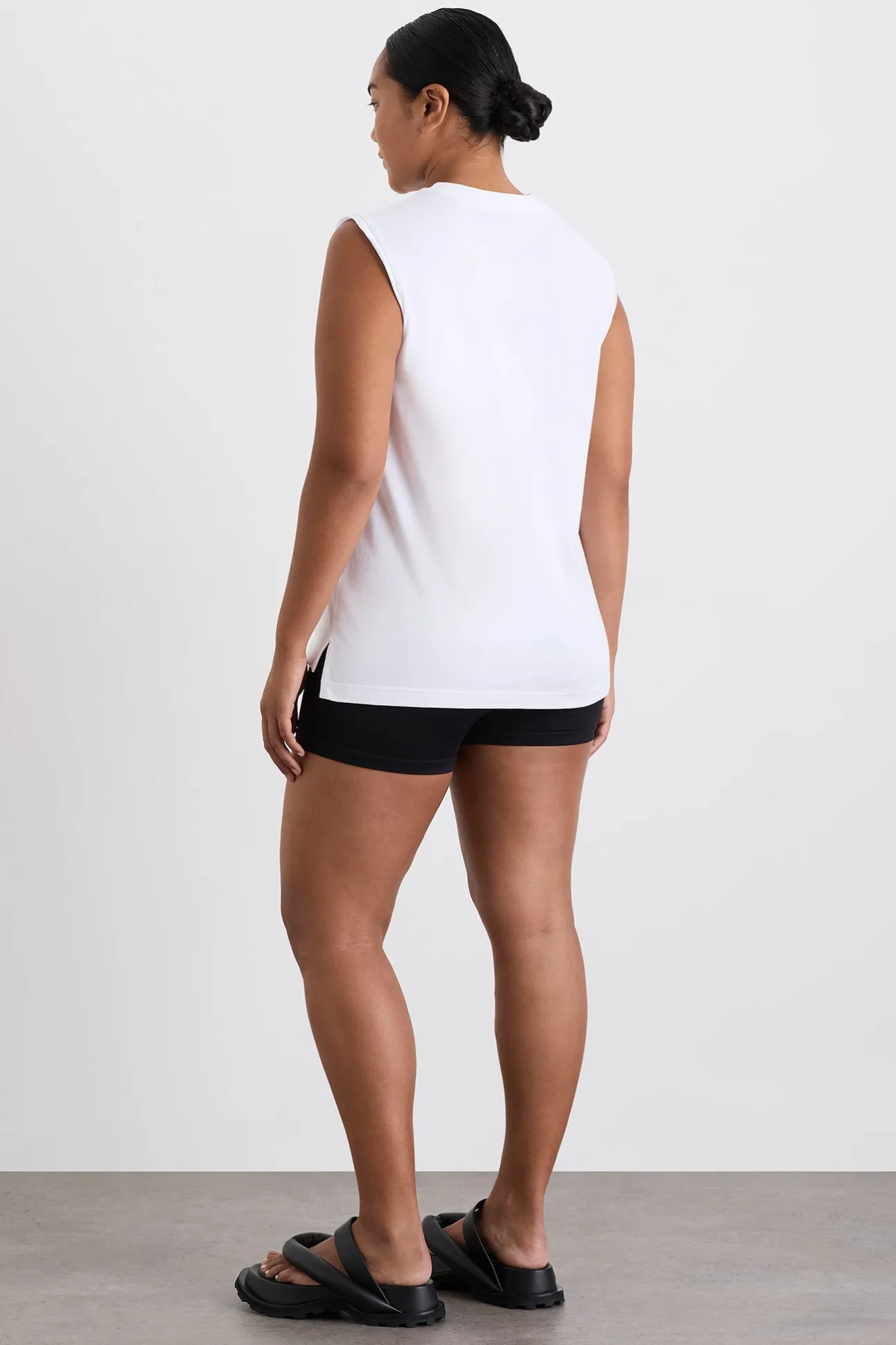cursive_logo_longline_tan_5.webp Cursive Logo Longline Tank 101