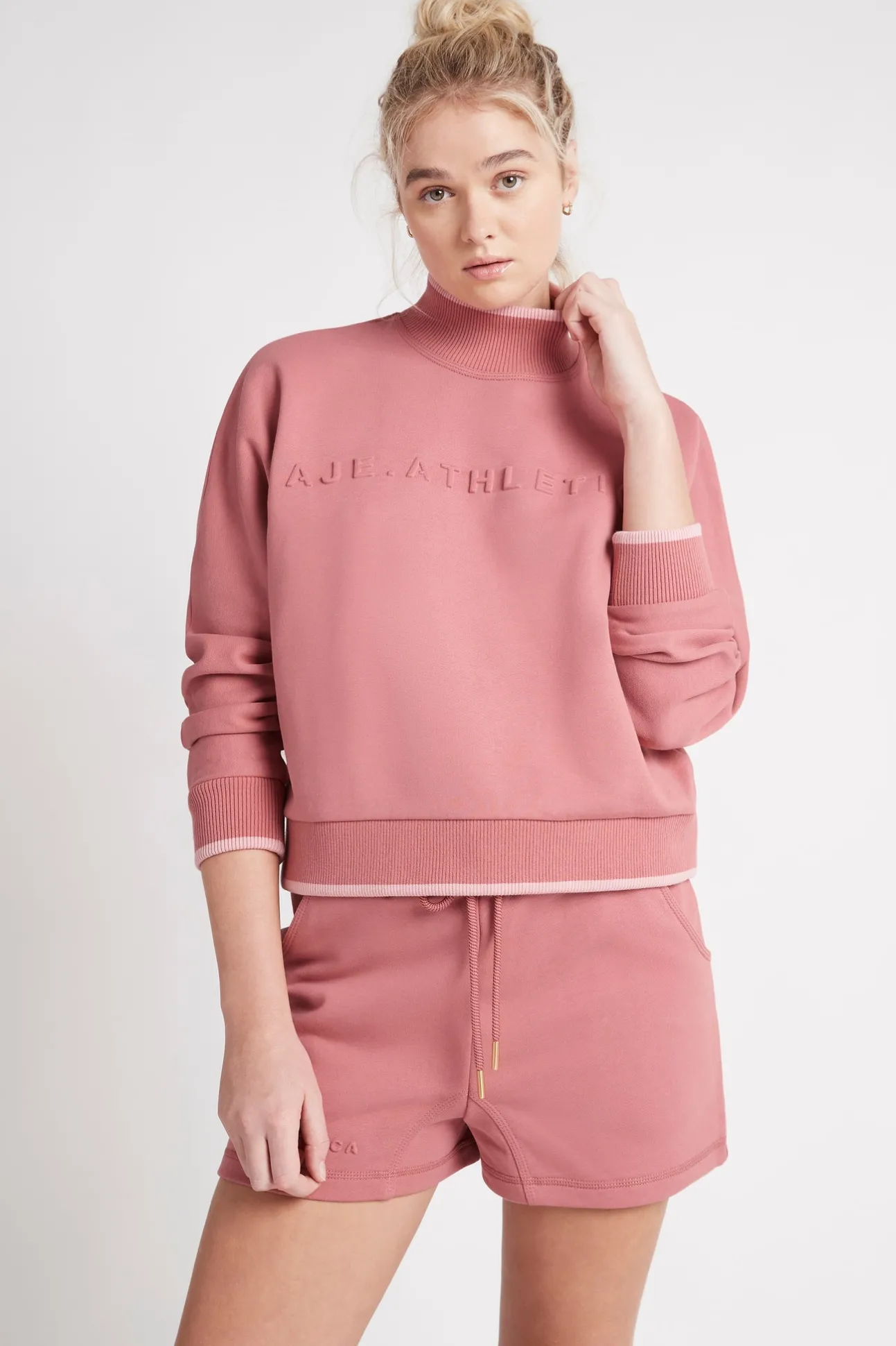 embossed_signature_logo_f_0.webp Embossed Signature Logo Funnel Neck Jumper 412