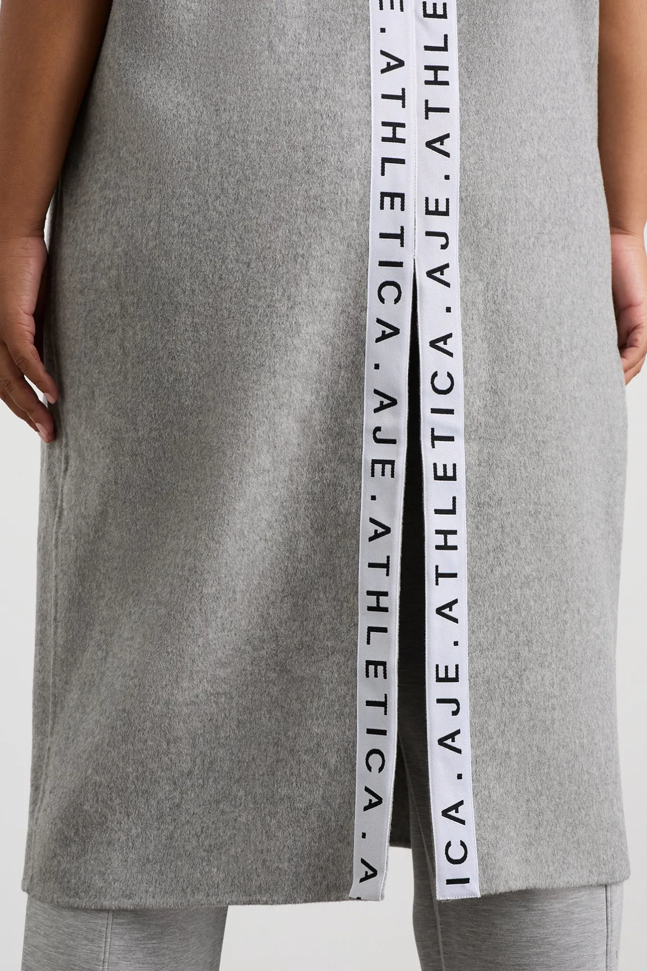 split_back_sleeveless_coa_12.webp Split Back Sleeveless Coat 760