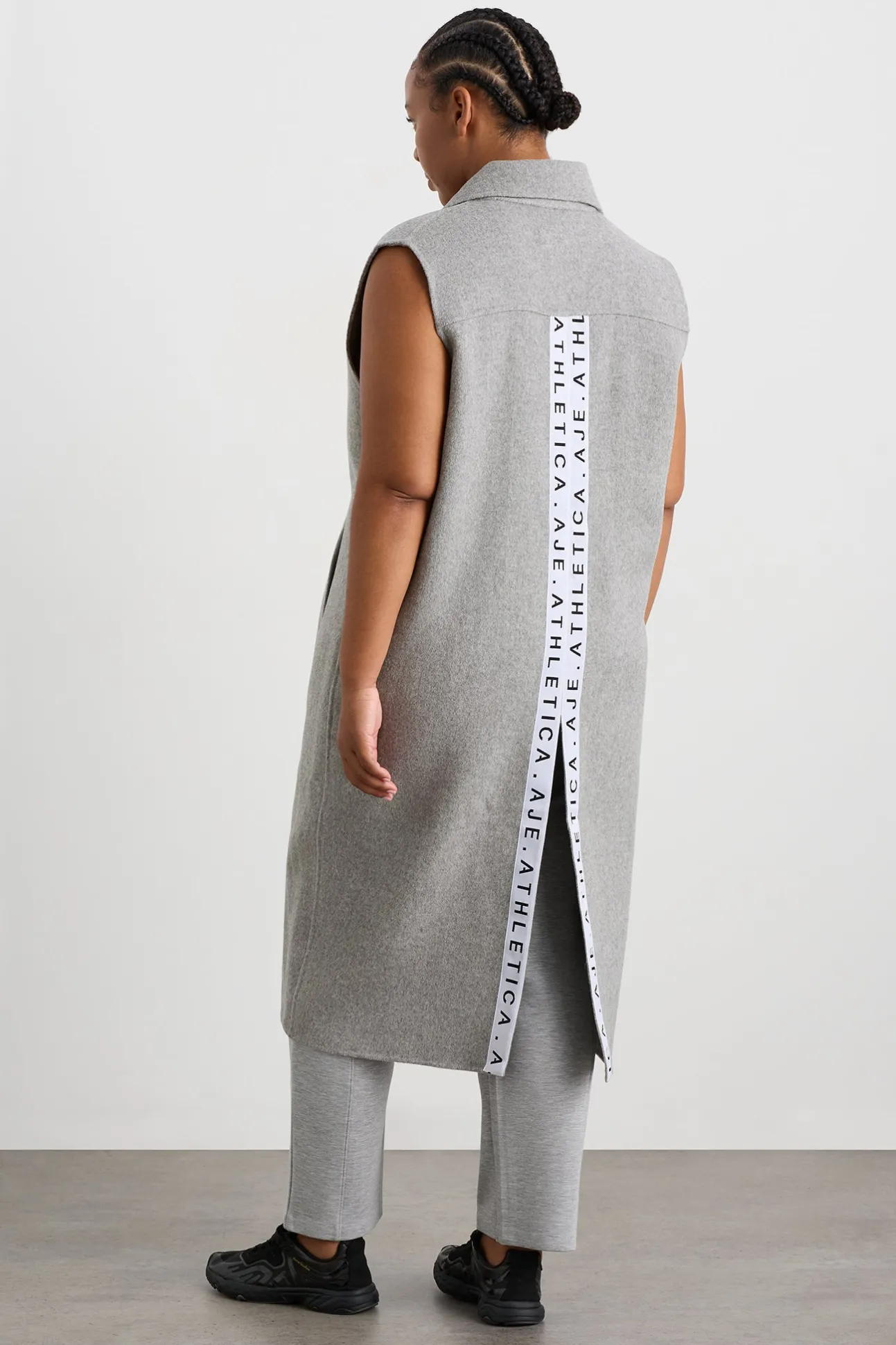 split_back_sleeveless_coa_14.webp Split Back Sleeveless Coat 760